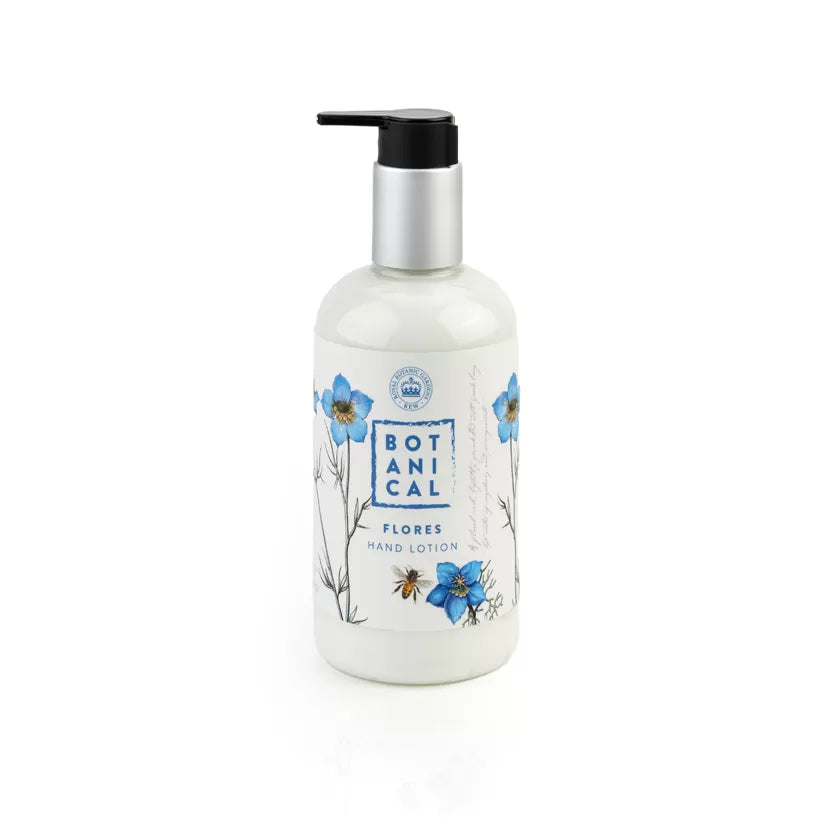A pump bottle of Flores Hand Lotion with a floral design on the label.
