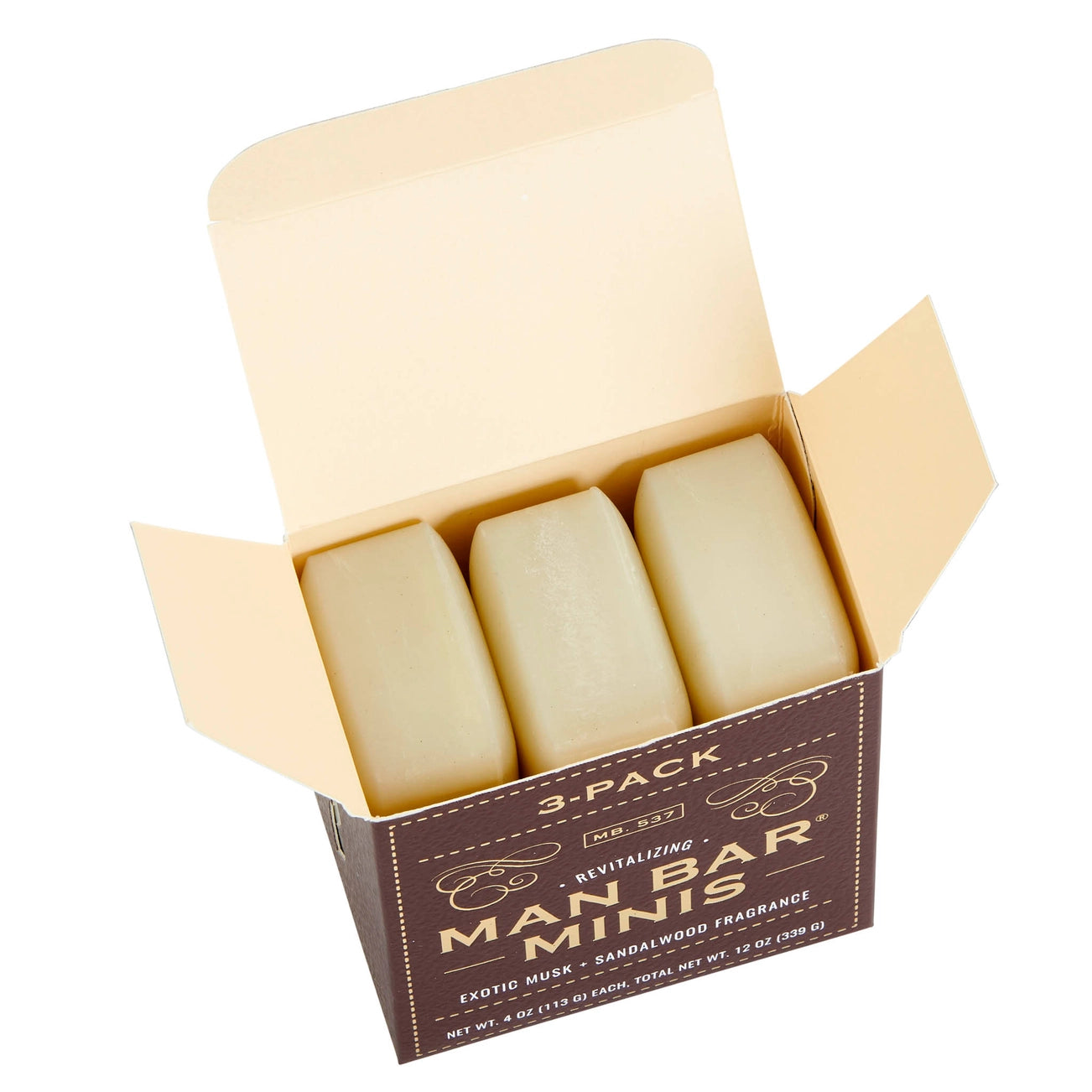 Three small bars of soap packaged in a brown box with the text 'MAN BAR MINIS 3-pack' printed on it