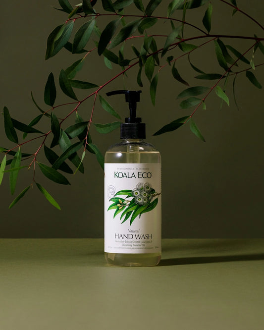 Koala Eco hand wash bottle with green leaves in the background