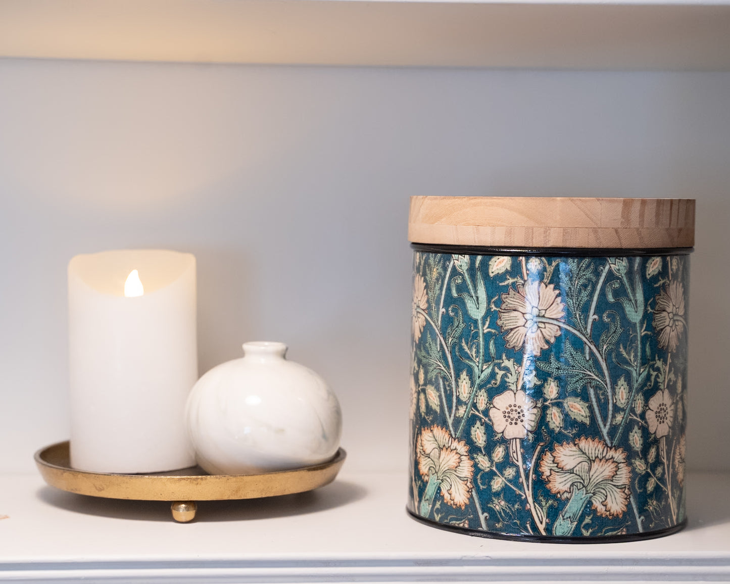 flower storage canister with wood lid on shelf for pretty home storage