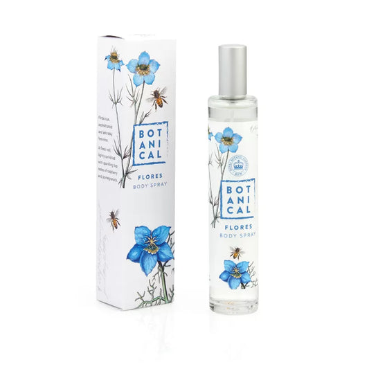 A bottle of Flores Body Spray with a floral design, accompanied by its packaging box, both featuring illustrations of blue flowers and insects.