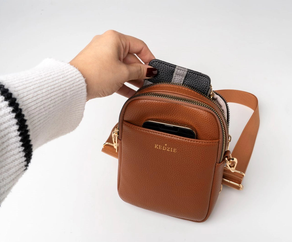 model showing storage of kedzie solstice crossbody purse