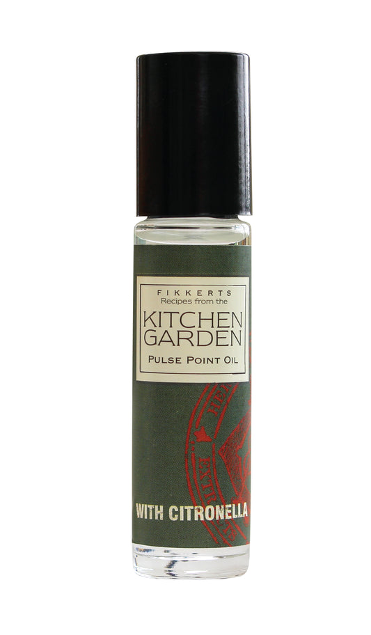 A small, clear glass bottle with a black cap, labeled as 'Kitchen Garden Pulse Point Oil with Citronella'