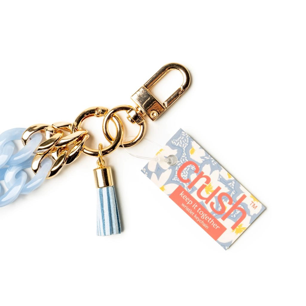light blue close up of acrylic keychain with easy swivel clip