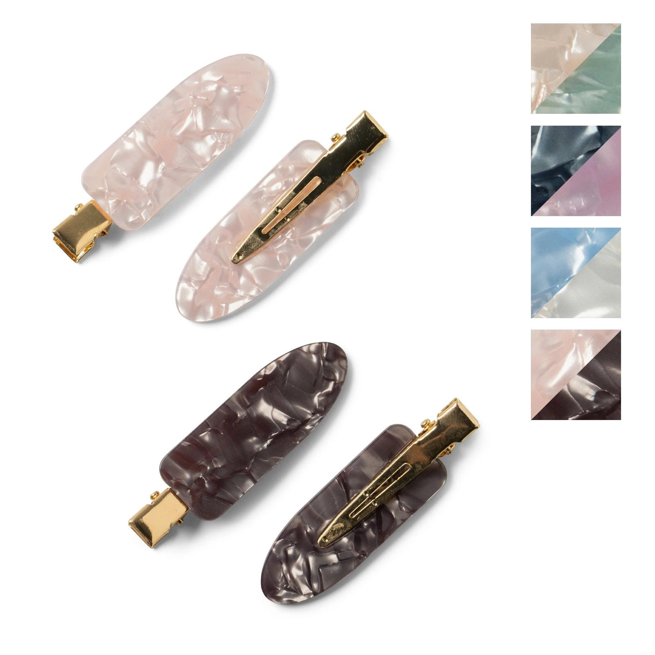 A set of four hair clips in two colors, with a marbled design and metallic gold clasps.