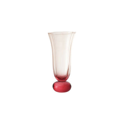 Pink fluted drinking glass with ball stem, clear cup and pink base