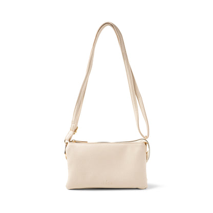 crossbody strap shown on cream kedzie eclipse style wallet purse