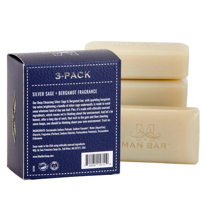 Three bars of soap with packaging on a white background