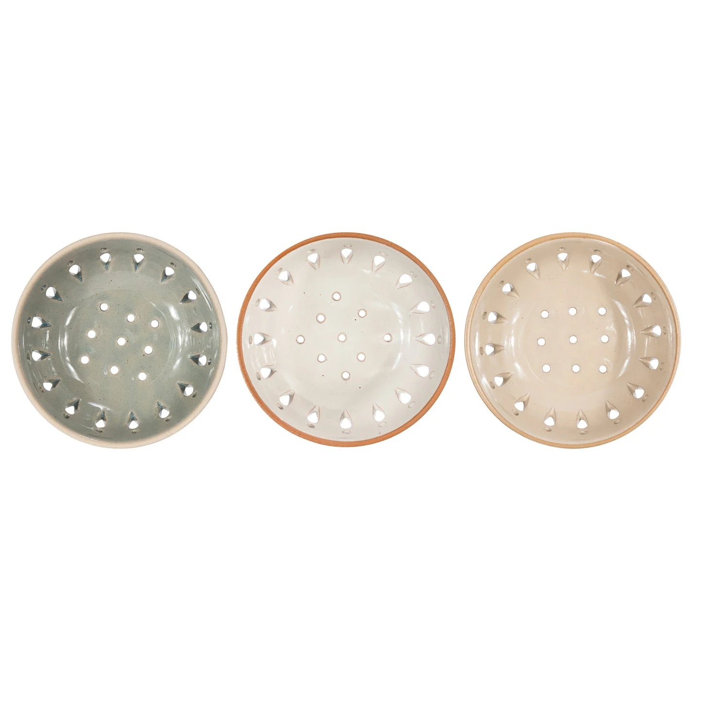 Three ceramic bowls with perforated designs in green, beige, and cream on a white background