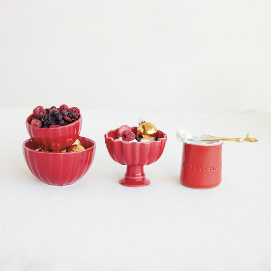 Red scalloped footed bowl, glazed ceramic, with blueberries and raspberries
