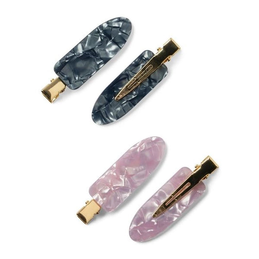 A set of four hair clips in two colors, gray and pink, with a marbled design and metallic gold clasps.
