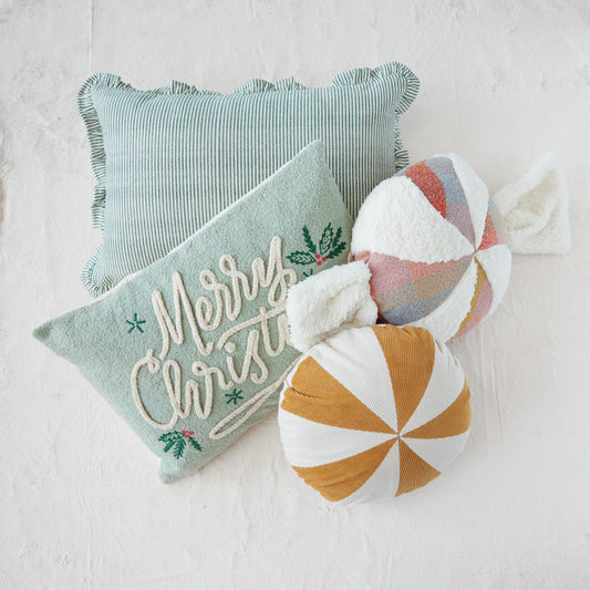 Striped woven ruffle pillow with light blue and white stripes, fringed edges