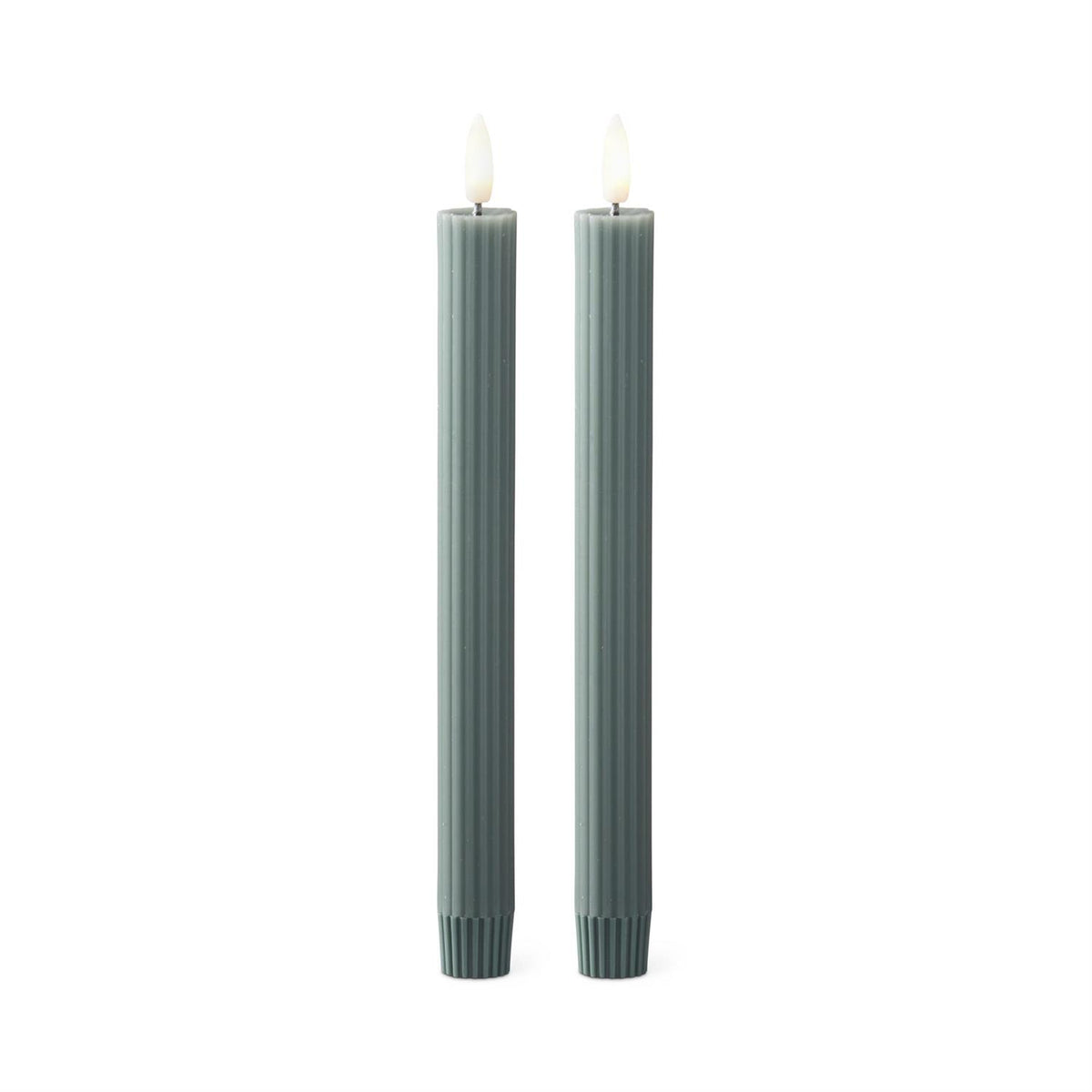 Two gray green candles on a white background