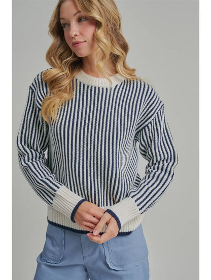 Vertical striped crewneck sweater in navy and cream knit with ribbed cuffs