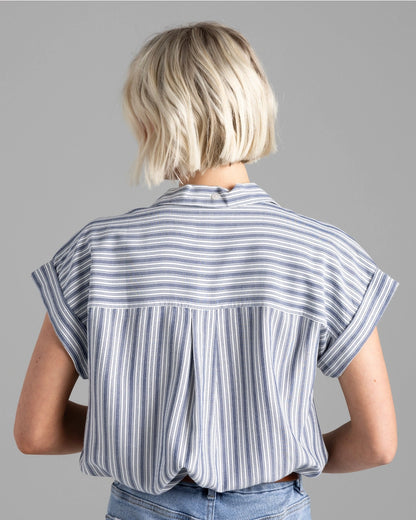 back view of short sleeve blouse with stripes and a rolled sleeve