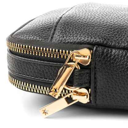 upclose detail of zipper on kedzie purse